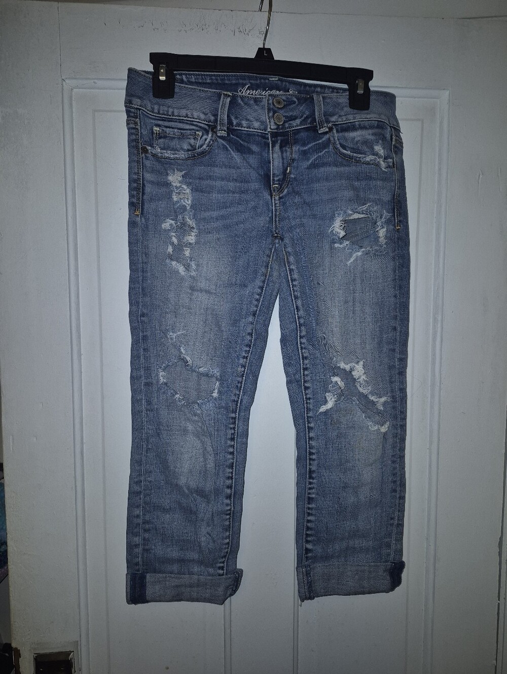 American Eagle medium-wash distressed cropped denim jeans